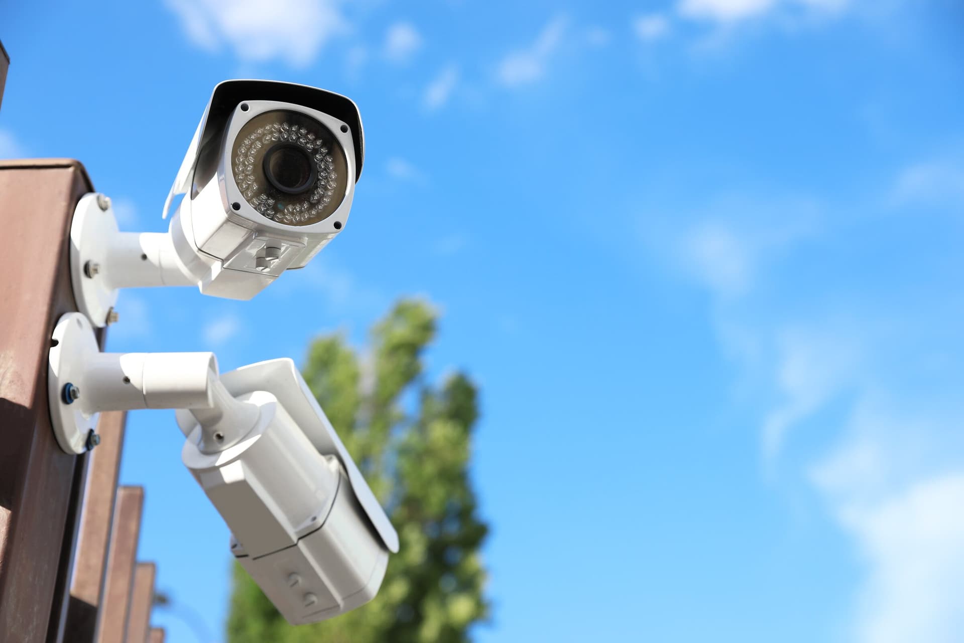 Commercial security cameras mounted on a building